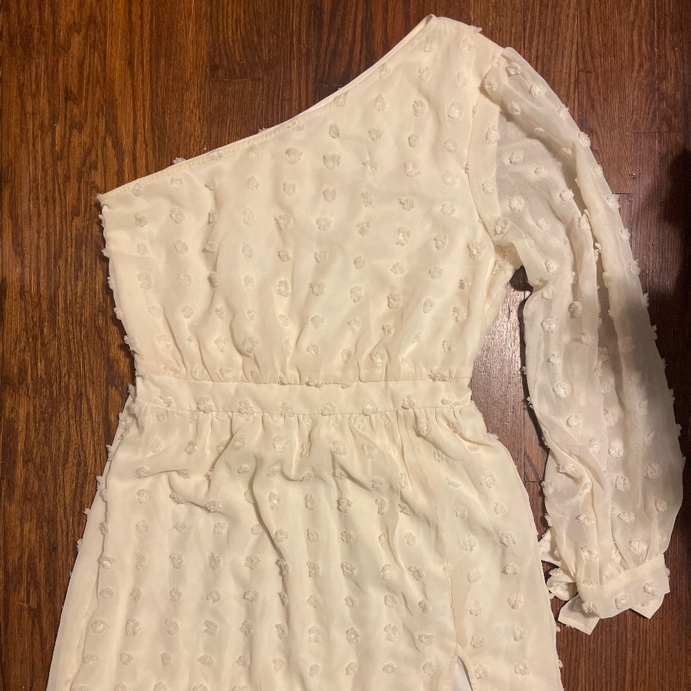 Cream polka dot dress with one sleeve